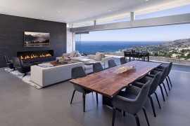 Stunning living area with terrace and view of the distant beach