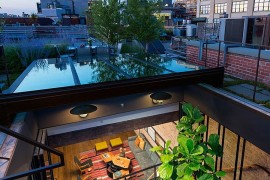 Sunken courtyard inside the transformed loft brings in ample light