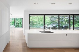 View of the lush greenery outside from the stylish kitchen
