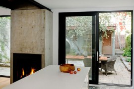 Concrete block and fireplace give the space a a unique focal point