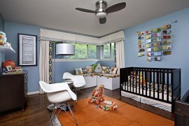 Nursery with a cozy reading nook in the corner