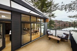 Private deck of the cottage overlooking the tranquil lake