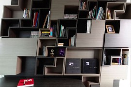 Shelves of the study inspired by the classic Ligne Roset sofas