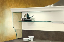 Sleek glass shleves help shape a fabulous display in the kitchen