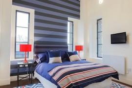 Snazzy use of stripes in the contemporary bedroom in London