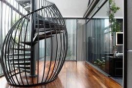 Stunning spiral staircase connecting the master bedroom to the study above