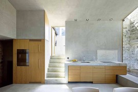 Wooden shelves bring warmth to the fascinating interior