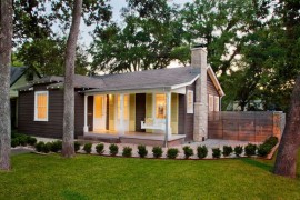 A row of manicured shrubs creates a tidy look near the front entrance