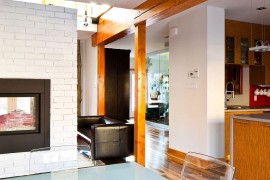 Acrylic chairs and smart lighting steal the show in the dining area