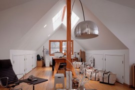Attic home office with ample space and natural light