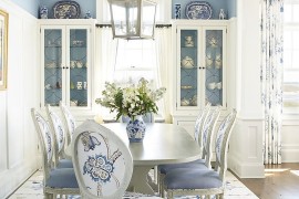 Beach style dining room in classy blue and white