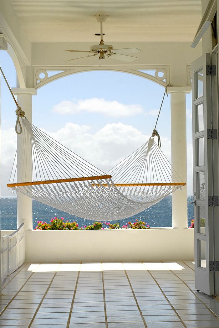 Beach style porch with hammock overlooking the ocean [Design: Springline Architects]