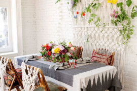 Boho dining room with a macrame wall hanging