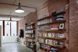 Brick and wood give the interior a charming, relaxed appeal