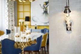 Custom lighting fixtures and brilliant accessories add uniqueness to the opulent villa