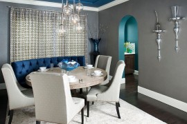 Gray dining room with custom designed blue banquet and ceiling
