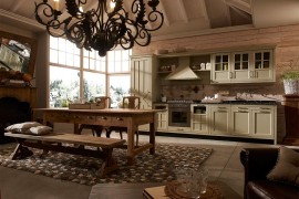 Heavy wooden surfaces and overall ambiance give the kitchen a timeless look