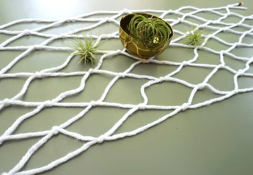Macrame table runner with air plants