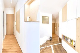 Narrow entry and sleek wall cabinets inside the apartment