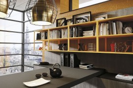 Open units in yellow lacquered finish add color to the kitchen
