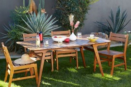 Outdoor dining area surrounded by plants