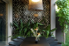 Outdoor dining space with deep tones