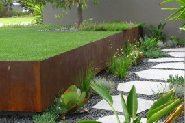 Plants at the edges of the walkway create visual interest