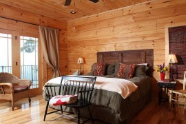 Rustic bedroom with barn wood headboard