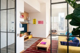 Smart use of glass partitions inside the trendy Broadway home