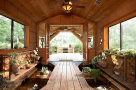 Stunning pond at the entry brings the outdoors inside