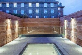 Timber screen brings privacy to the revamped couryard
