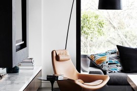 Trendy contemporary living room with a comfy reading corner