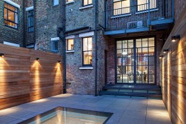 Walk on roof-light with mesh in the courtyard