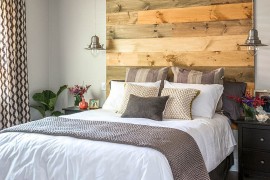 Wooden headboard adds warmth to the contemporary bedroom