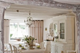 All white dining room delivers a tranquil French Country look