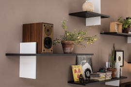 Built-in book ends add another dimension to the floating bookshelves