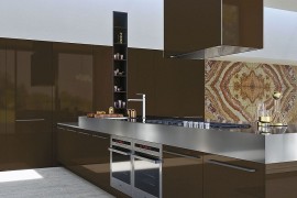 Central hood becomes the focal point of this kitchen composition