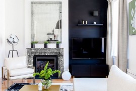 Dark media wall in the corner of the lving room