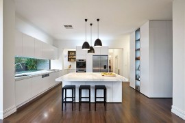 Dark pendant lights offer wonderful visual contrast in the kitchen
