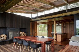 Design of the ceiling and large windows bring in ample light