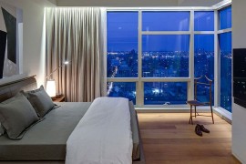 Drape allow the homeowner to switch between awesome views and complete privacy in the bedroom