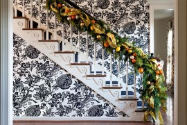 Eclectic and cheerful backdrop for the festive staircase