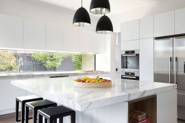 Fabulous contemporary kitchen with a central marble island