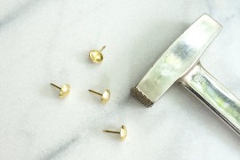 Have a hammer ready for securing the upholstery nails in place