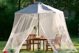 Mosquito net over an umbrella
