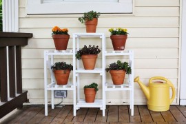 Plant shelf on a front porch