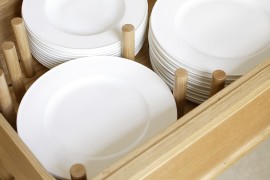 Plate drawer in the kitchen island that can be tucked away with ease