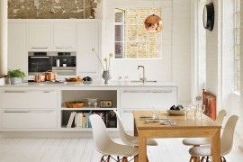 Pops of copper in the kitchen complement the pendant perfectly