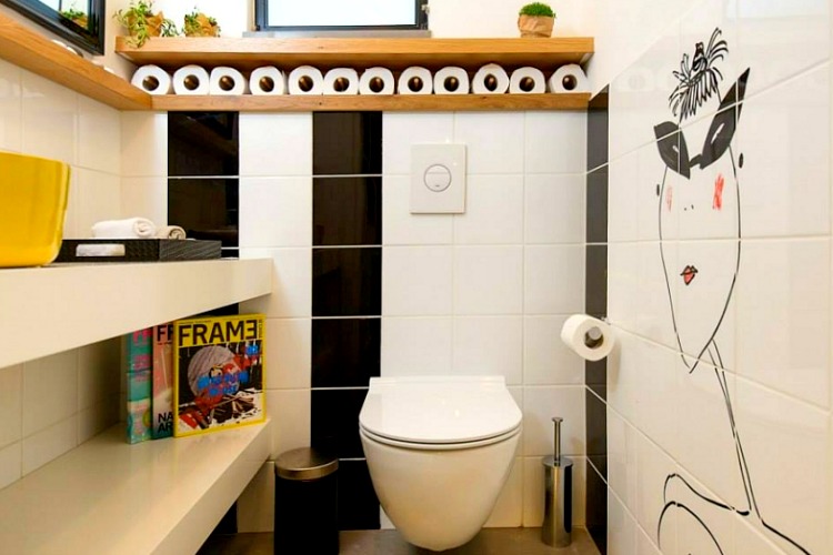 The mural makes this bathroom modern in an instant