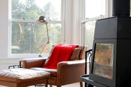 Small reading corner next to the fireplace